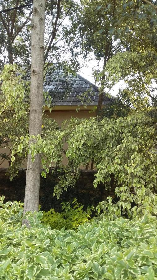 Random Park Hotel Kigali Bagian luar foto